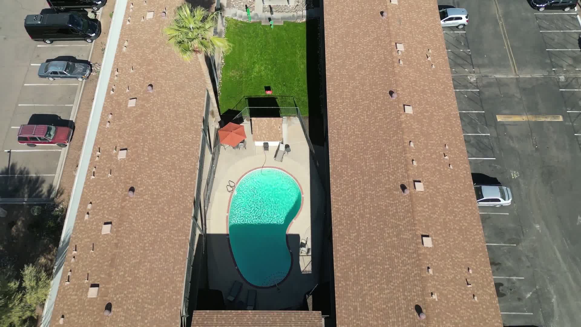 Aerial view of a Neighborhood Ventures multifamily property with the Phoenix metro stretching behind it